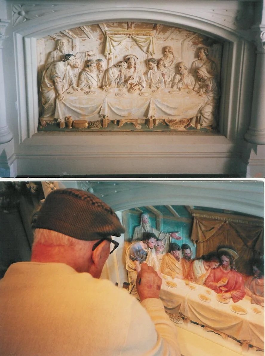 Family archive image of an artist working on a Last Supper relief.