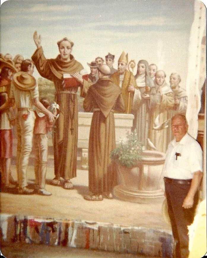 Family archive studio portrait of a person beside a work in progress.