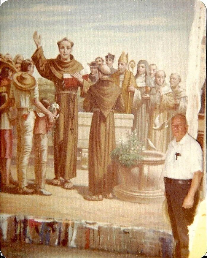 Family archive image of an artist beside a sacred work in progress