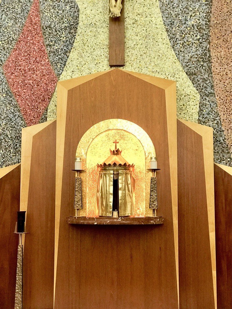 Completed gold mosaic niche and tabernacle above the marble platform at Saint Columban.