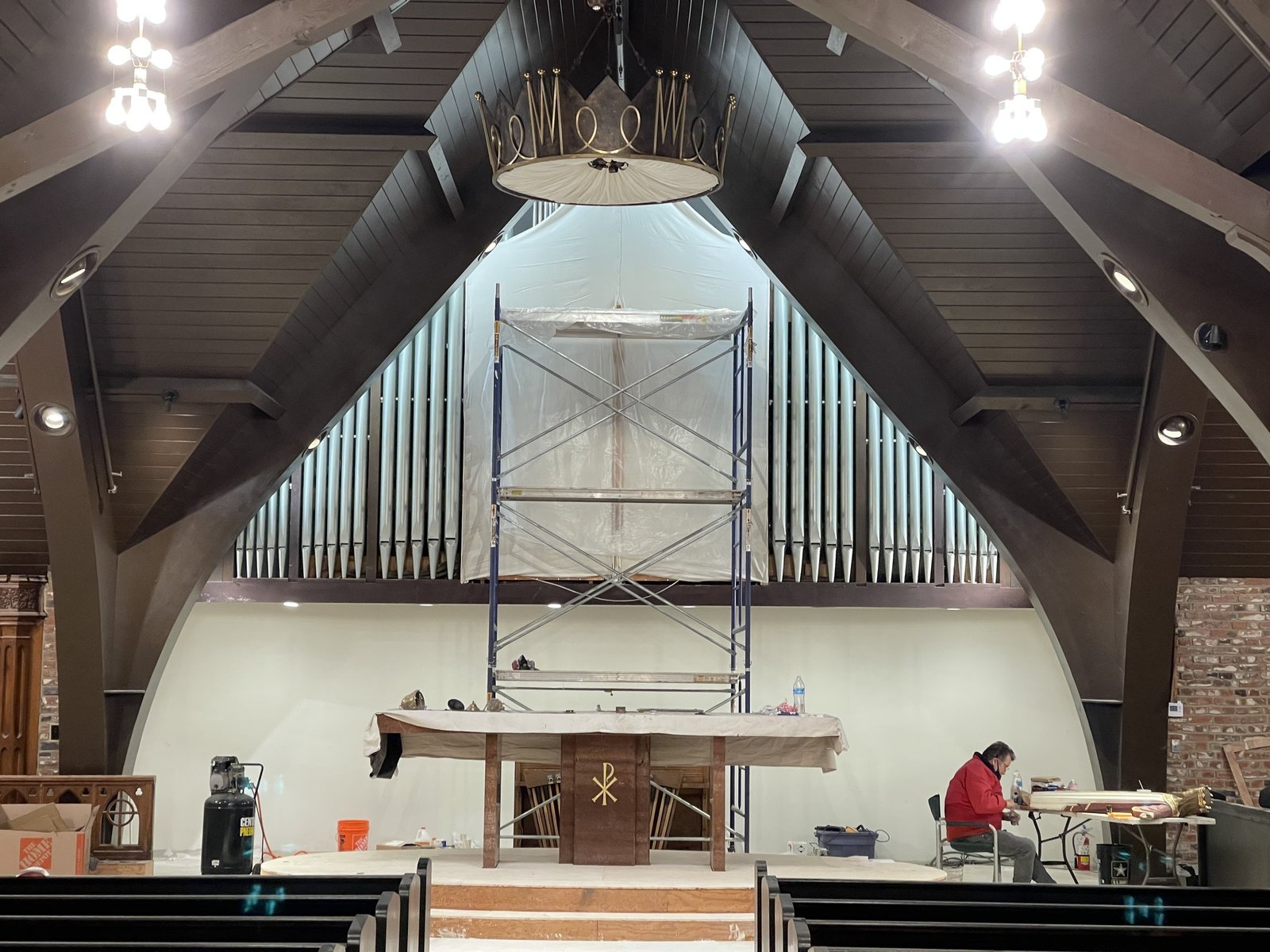 Scaffolding behind the altar beneath the organ pipes during interior work