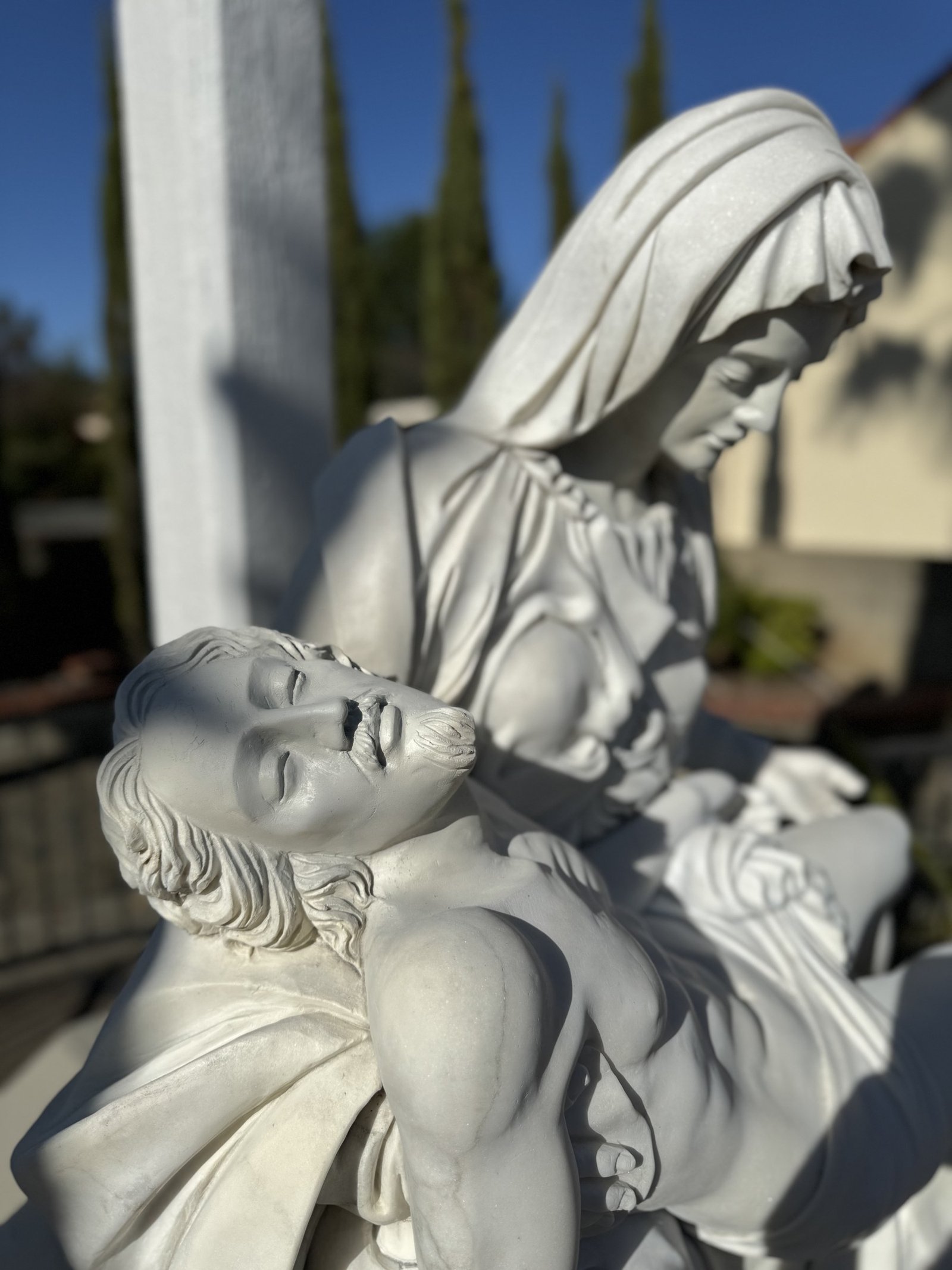 Side view of the restored Pietà showing the faces of Jesus and Mary.