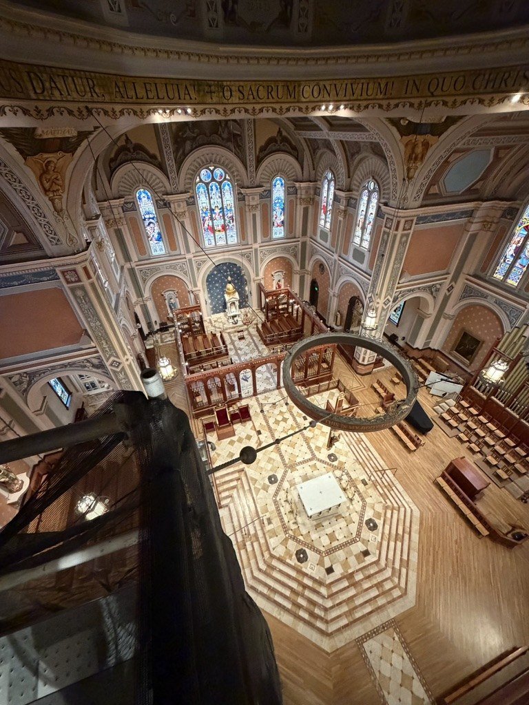 View from the elevated work area down to the cathedral sanctuary and altar.