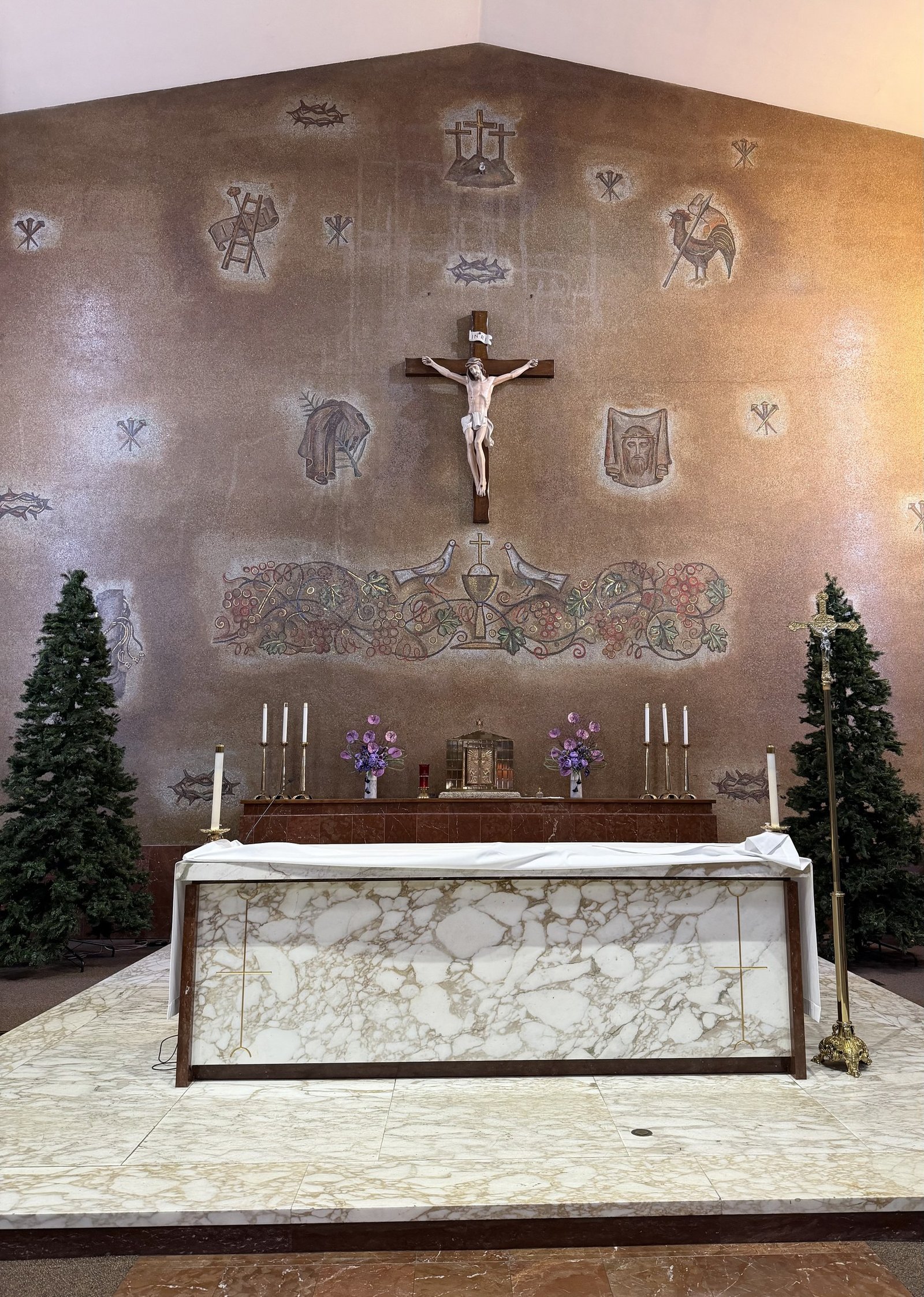 Main sanctuary mosaic wall behind the crucifix and altar before restoration.